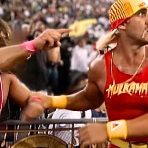 Bret Hart gives a reluctant nod as Hulk Hogan steps in against Yokozuna at WrestleMania 9, just moments after Hart lost the WWF Championship. The aftermath would spark decades of controversy.