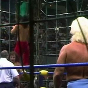 The Great Muta saves the day with his green mist at the inaugural Halloween Havoc in 1989. [photo courtesy of the WWE Network]