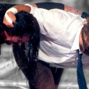 Undertaker and Mick Foley battle it out atop the Hell in a Cell moments before all hell breaks loose.
