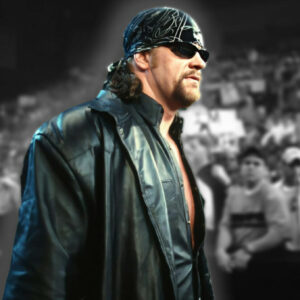 The Undertaker walking through an arena of fans amid rumors that Eric Bischoff was trying to snag him to the WCW