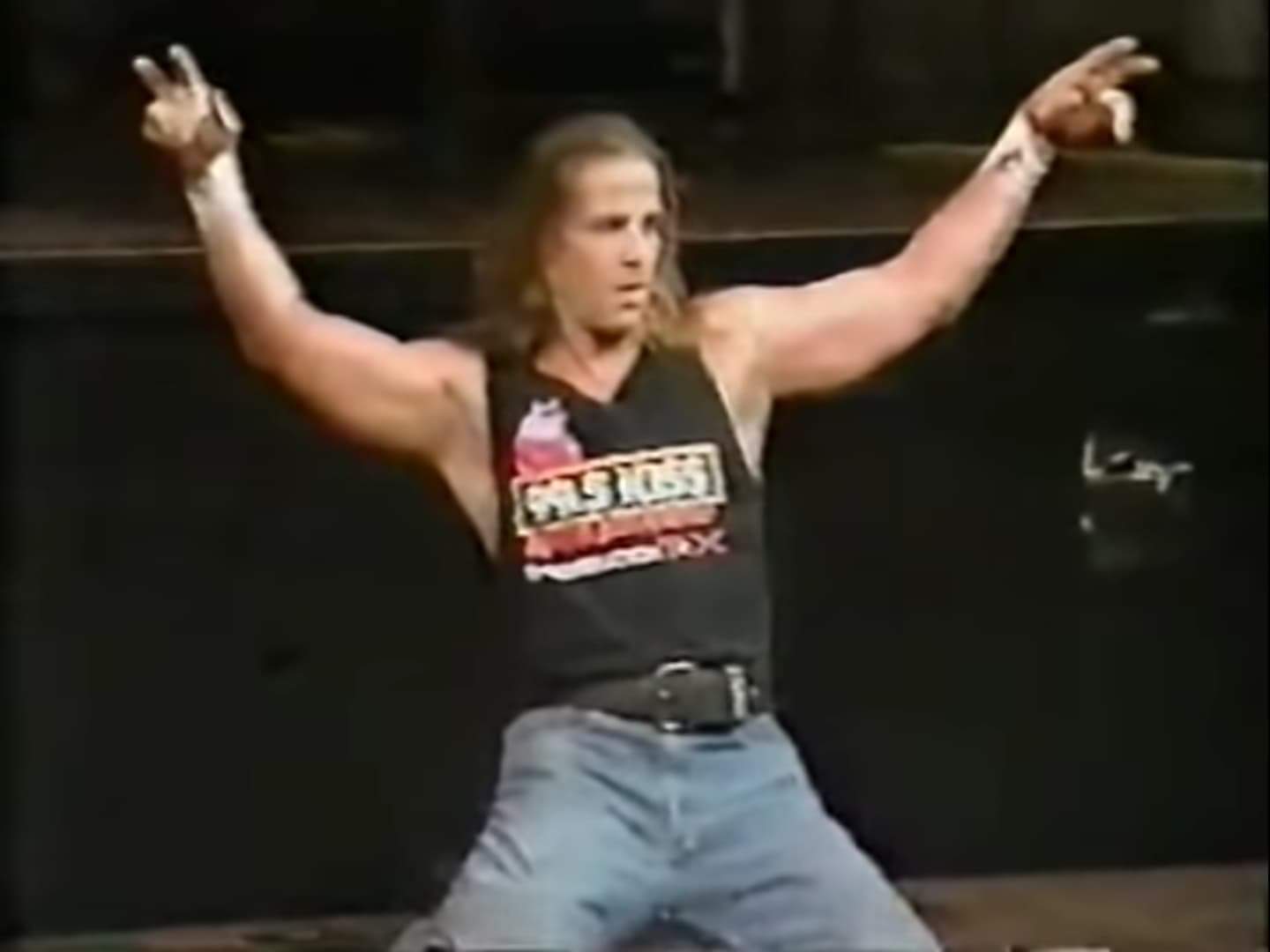 The Showstopper, Shawn Michaels poses for the fans after hip tossing his opponent Venom through two tables during his one-off in-ring return in April 2000 for his Texas Wrestling Alliance promotion.