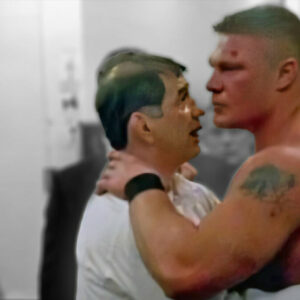 Gerald Brisco consoles Brock Lesnar backstage at WrestleMania 19.