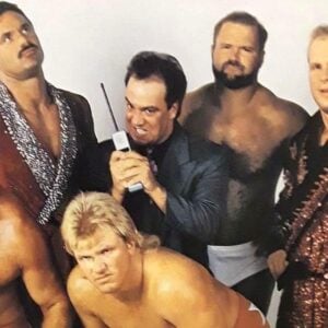 The Dangerous Alliance - Larry Zbyszko, Rick Rude, Bobby Eaton, Paul E. Dangerously (Paul Heyman), Arn Anderson, and Stunning Steve Austin