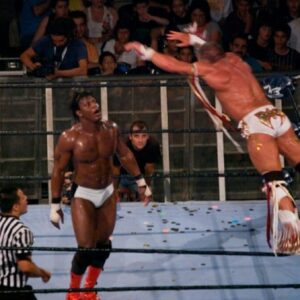 The Ultimate Warrior glides in the air towards his opponent, Orlando Jordan, in what would be Warrior's final-ever match. Nu Wrestling Evolution, Barcelona, Spain, June 25, 2008.