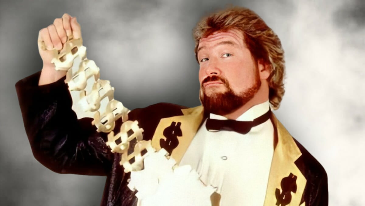 Ted DiBiase showing off his Million Dollar Championship belt. [Photo courtesy of WWE.com]