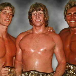 Lance Von Erich (right) alongside his on-screen family, Kevin and Mike Von Erich, in 1986.