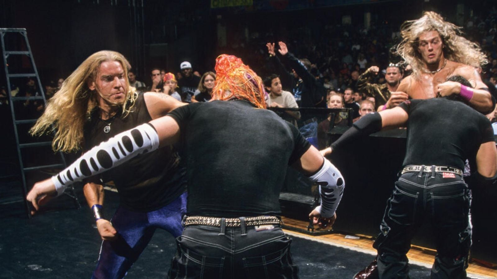 8 Ladder Matches That Redefined Wrestling History Edge and Christian face The Hardy Boyz in a tag team ladder match at No Mercy 1999