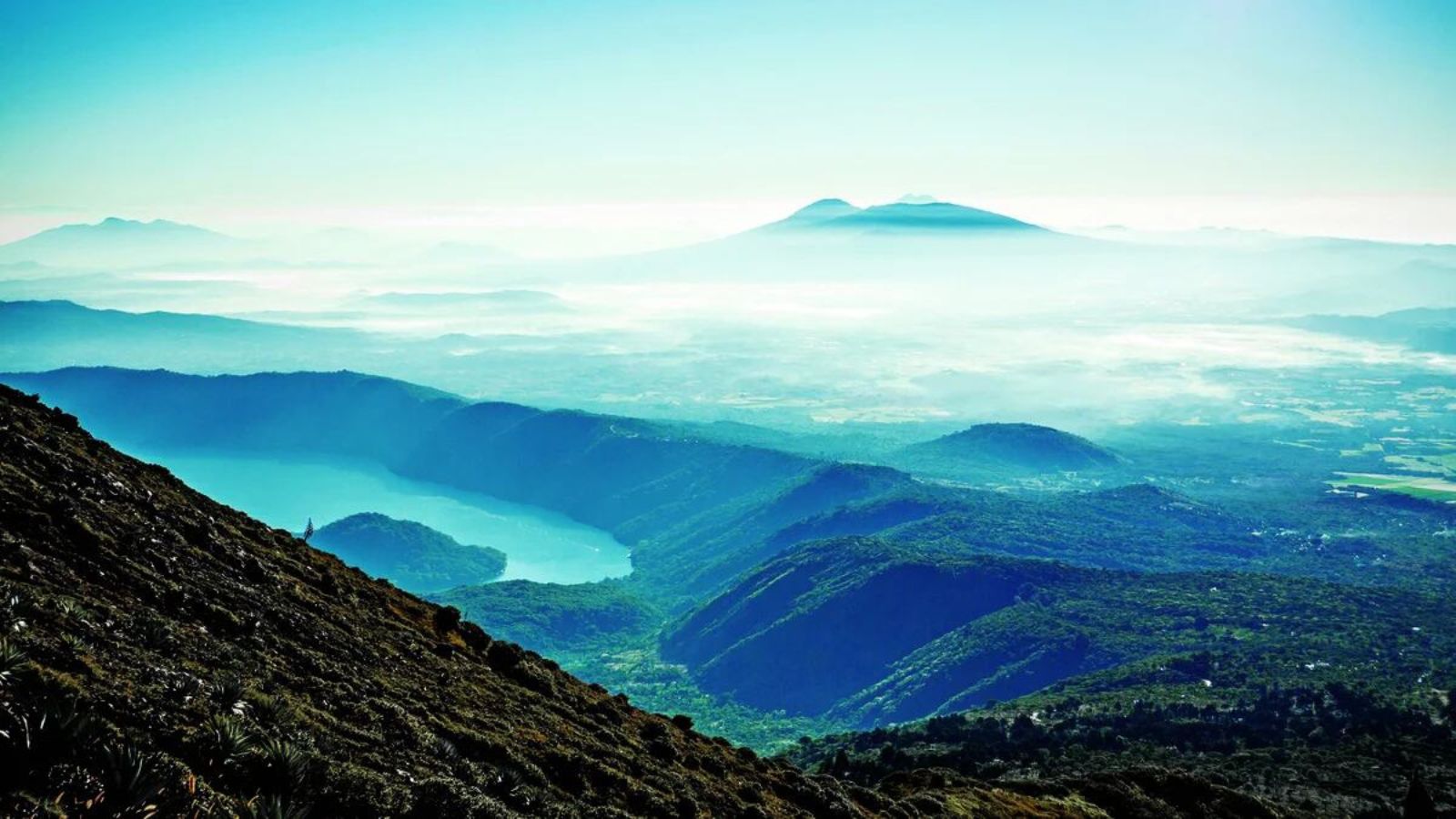 Lake Coatepeque in El Congo, Santa Ana Department, El Salvador - the scenic beauty that contrasts with the country’s wrestling struggles. 