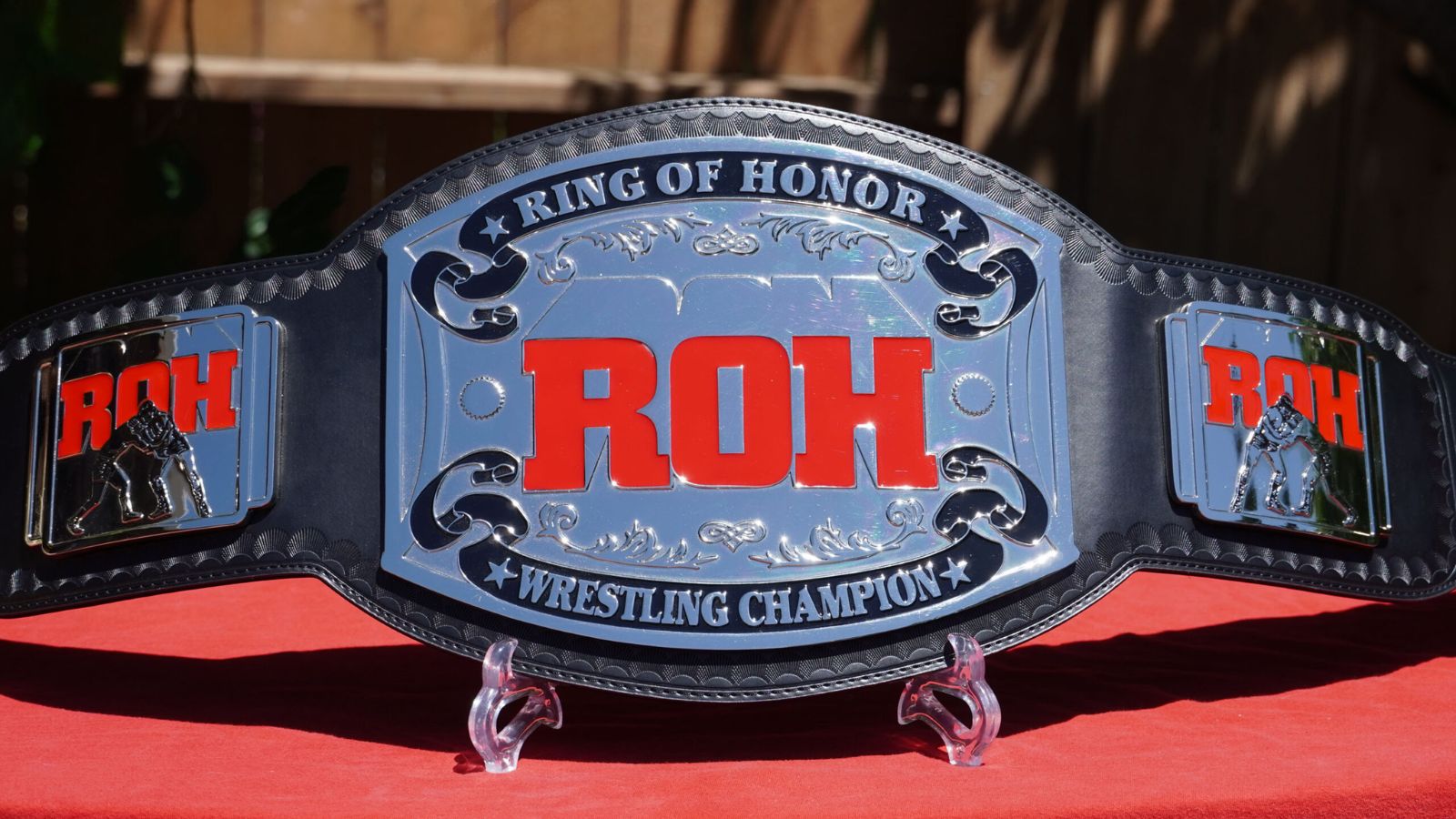 Original ROH World Championship, established 2002 with Low Ki, minimalist black-strap and red 