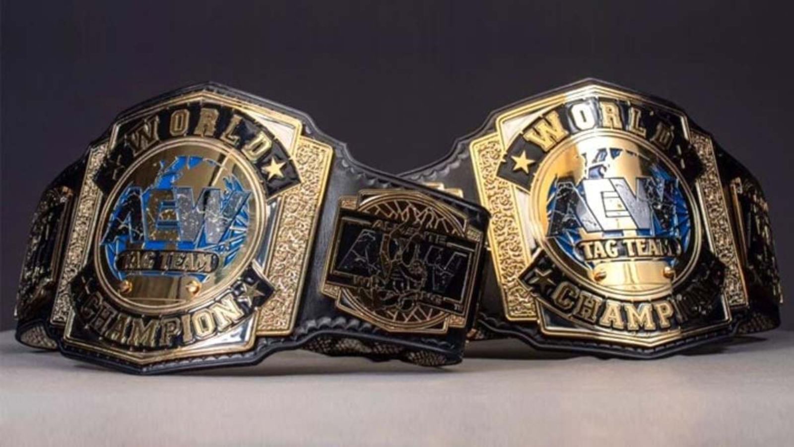 AEW World Tag Team Championship, launched in 2019 with SCU (Frankie Kazarian &amp; Scorpio Sky), sports a blue-globe center plate and intricate gold etching by Top Rope Belts.