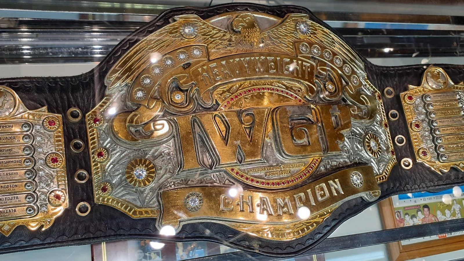 The IWGP World Heavyweight Championship (third design, 2008) was first held by Hiroshi Tanahashi, featuring etched side plates that list former champions, thereby cementing New Japan's legacy. 