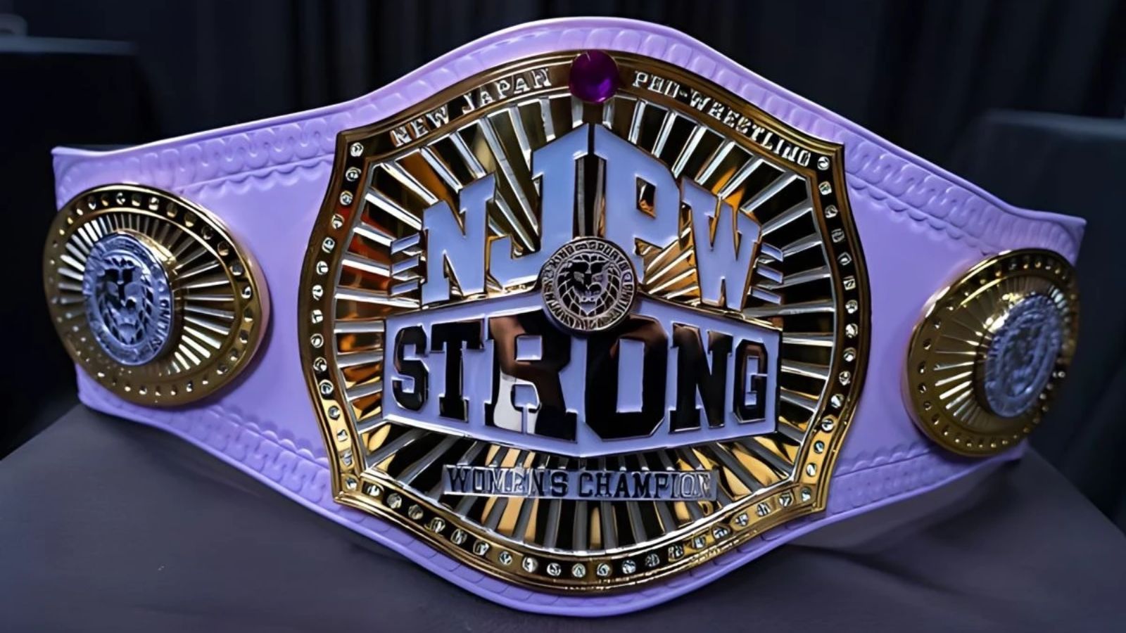 NJPW STRONG Women’s Championship debuted in 2023 with Willow Nightingale, sporting an uncommon lilac strap and sharp gold plates, defining the brand’s women’s division.