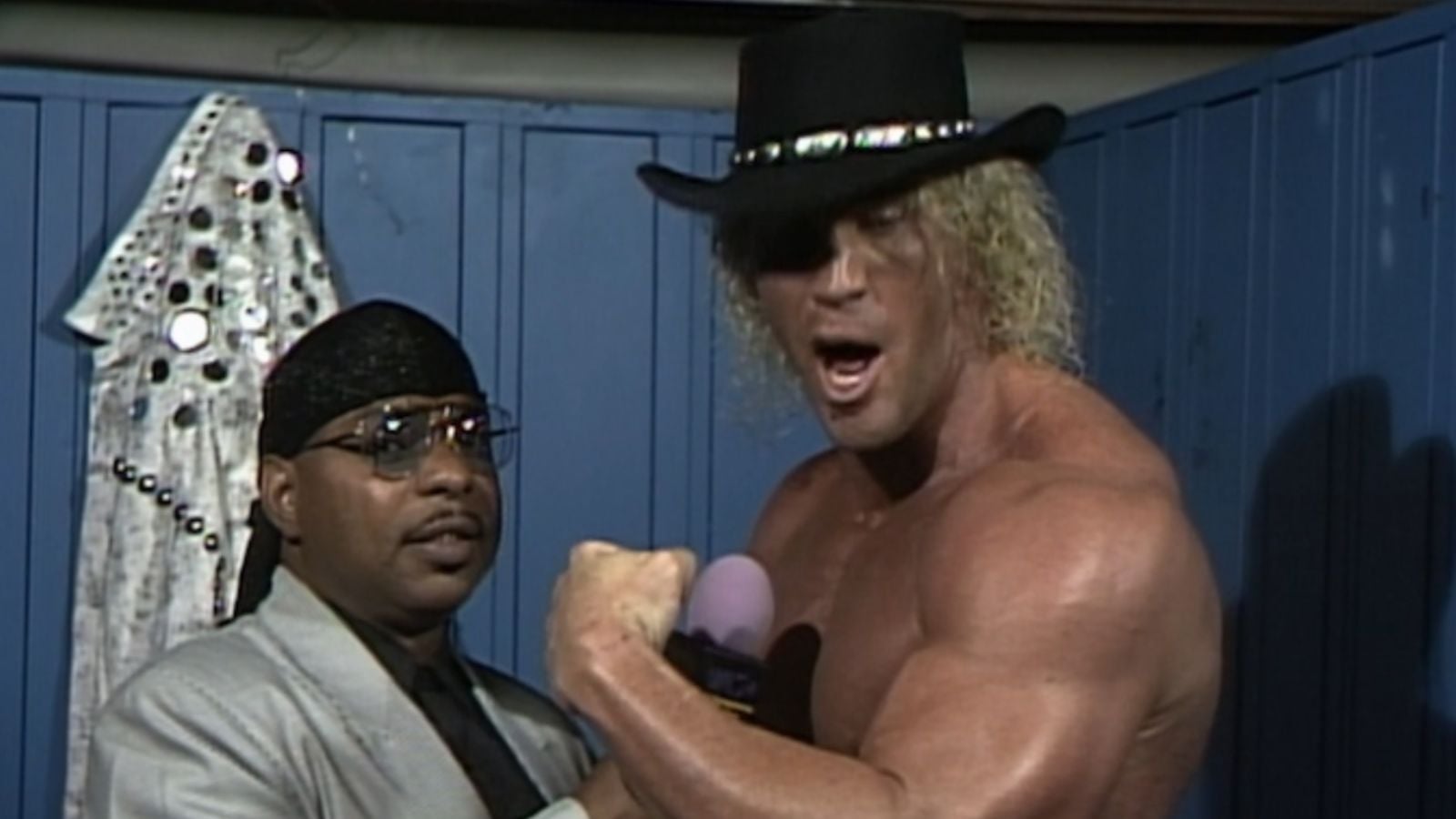 Van Hammer stands with manager Theodore Teddy Long during his early WCW run, when high expectations surrounded the newcomer.