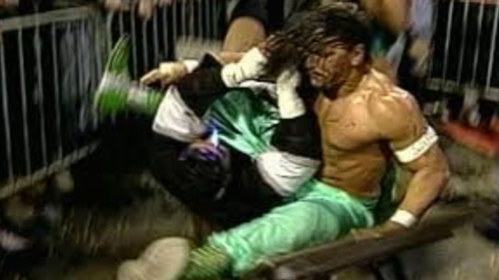 Sabu dropped a brutal leg at ECW’s Double Tables 1995. Trained in the wild tradition of The Sheik, he became a master of dramatic visual impact throughout his legendary career. 