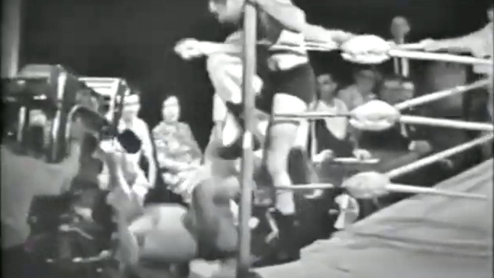Tag team legends Chris & John Tolos face Bob Nandor and Chet Wallick in 1960s wrestling. The feud led to one of the first recorded table break spots (not televised). 