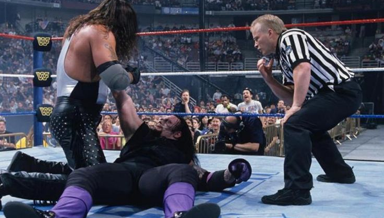 WWE referee Jack Doan supervises The Undertaker’s dramatic comeback against Diesel at WrestleMania XII on March 31, 1996 – witnessing every near fall and epic reversal from the most unique vantage point in wrestling history. 