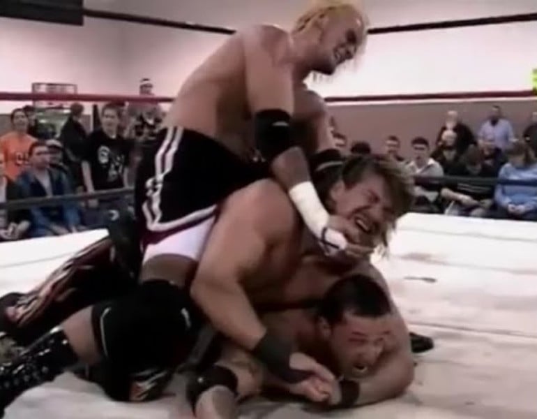 CM Punk, Eddie Guerrero, and Rey Mysterio deliver wrestling clinic in legendary IWA Mid-South Triple Threat Championship match that launched future WWE careers, March 1, 2002.