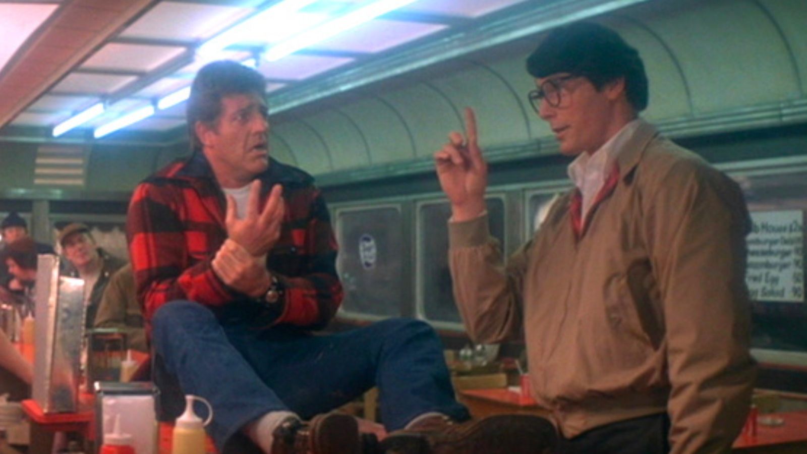 Clark Kent (Christopher Reeve) serves up payback to Rocky the trucker, played by wrestler-turned-actor Pepper Martin, in Superman II (1980). The scene bookends Clark’s earlier beatdown with a satisfying moment of justice after regaining his powers. Martin, who wrestled across the U.S. and Japan before acting, called the London shoot one of his most memorable career highlights.