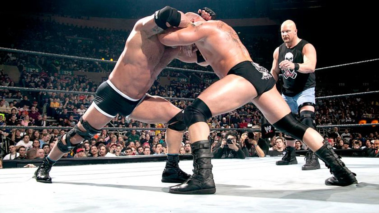 Brock Lesnar and Goldberg lock horns at WrestleMania XX while a hostile Madison Square Garden crowd jeers their impending WWE exits. 