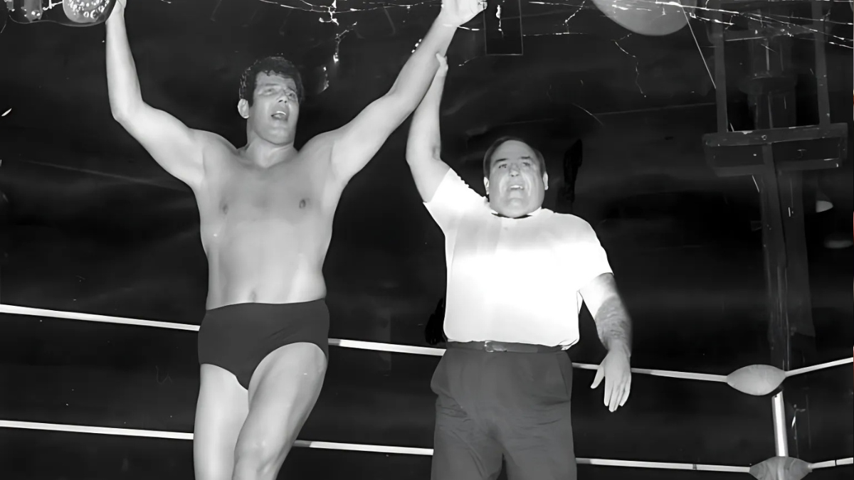 Mario Milano with his hand raised after a match in Australia.
