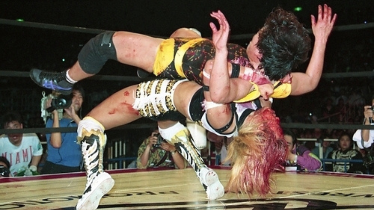 Akira Hokuto vs. Shinobu Kandori at Dream Slam I, a 30-minute technical masterclass that exemplified 1990s joshi wrestling’s hard-hitting style. AJW and JWP’s inter-promotional collaboration during this era produced some of wrestling’s most acclaimed matches from either gender.