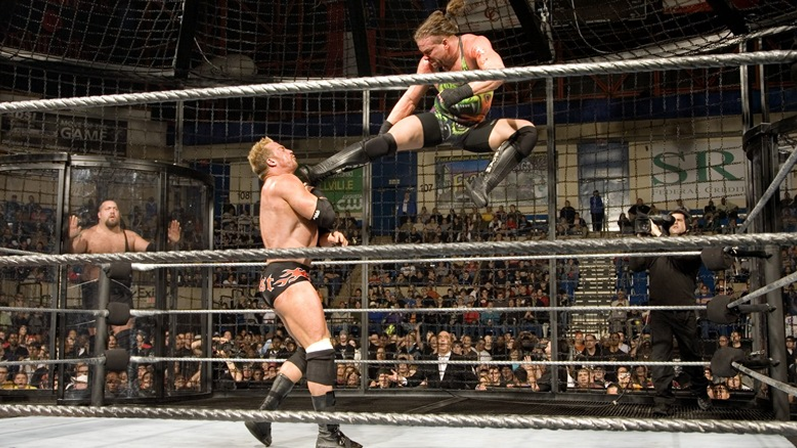 7 Elimination Chamber Moments That Broke WWE Rob Van Dam connects with a high kick on Test during the controversial Extreme Elimination Chamber match at ECW December to Dismember 2006, while ECW Champion Big Show watches from his chamber pod.