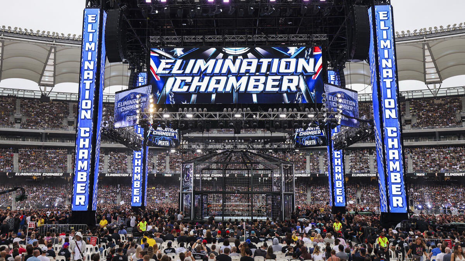 7 Elimination Chamber Moments That Broke WWE The Elimination Chamber structure at a 2024 international Premium Live Event (PLE), showcasing the evolution of WWE's most dangerous match concept from its 2002 debut to global stadium spectacles.