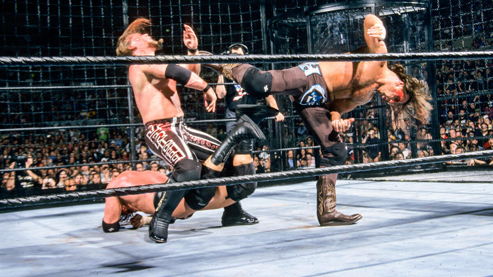 7 Elimination Chamber Moments That Broke WWE Shawn Michaels delivers his signature Sweet Chin Music superkick to Chris Jericho during the inaugural Elimination Chamber match at Survivor Series 2002, preventing Jericho's Walls of Jericho submission hold on Triple H.