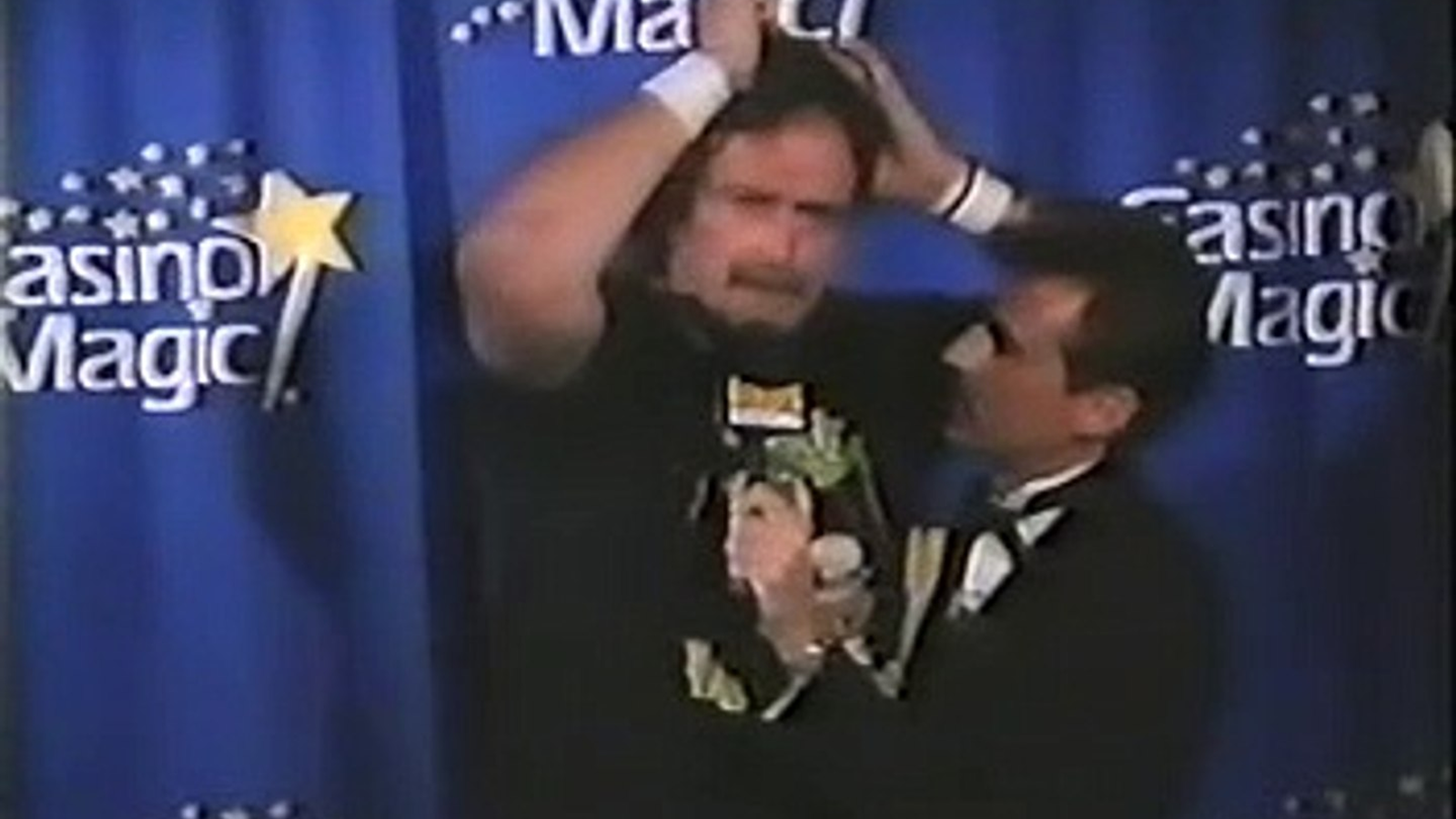 Jake the Snake Roberts delivers a meandering, intoxicated promo before his match against Jim 'The Anvil' Neidhart at the Heroes of Wrestling pay-per-view before wandering off camera.