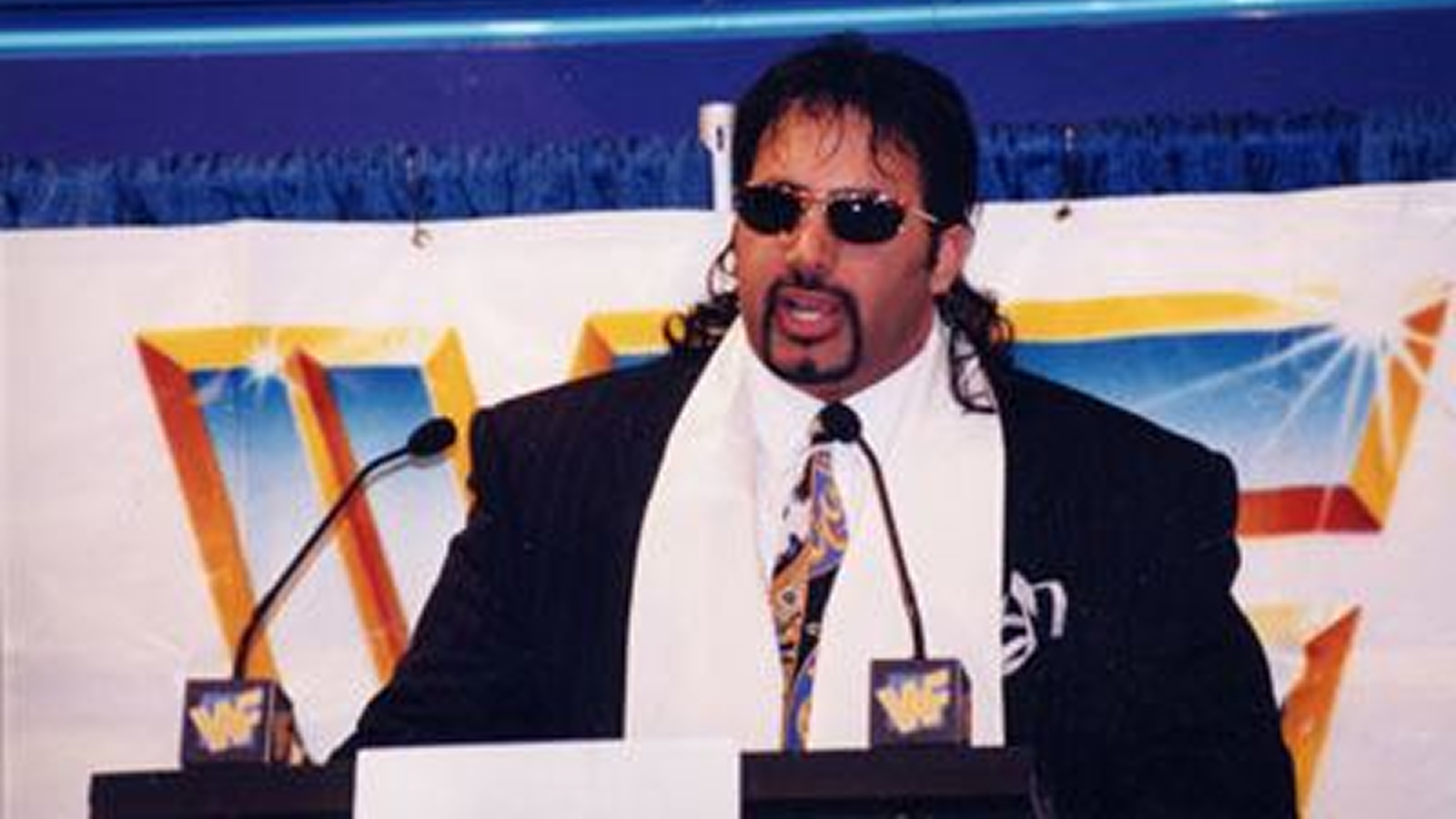 Tiger Ali Singh speaks at a press conference held by WWE at the Toronto Skydome to announce Singh's signing and upcoming debut with the company.