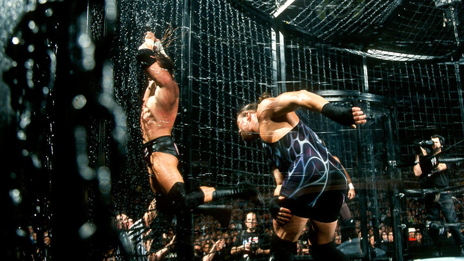 7 Elimination Chamber Moments That Broke WWE Triple H crashes into the steel chamber structure after Rob Van Dam's botched Five-Star Frog Splash at Survivor Series 2002, resulting in a dangerous throat injury that required overnight hospitalization.