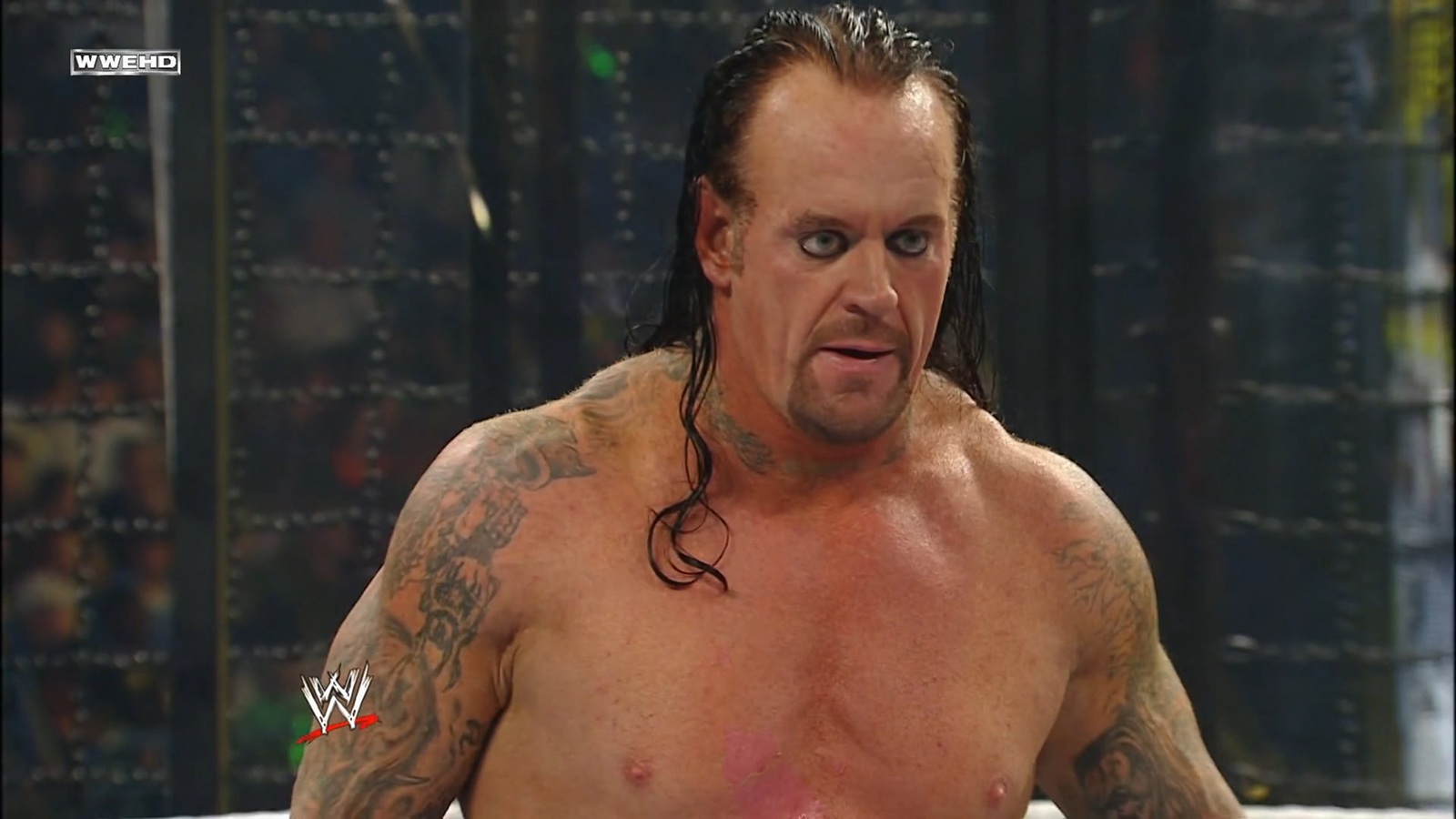 7 Elimination Chamber Moments That Broke WWE The Undertaker shows visible burn injuries after a pyrotechnic malfunction during his entrance at Elimination Chamber 2010, suffering first and second-degree burns before competing for nearly 40 minutes.