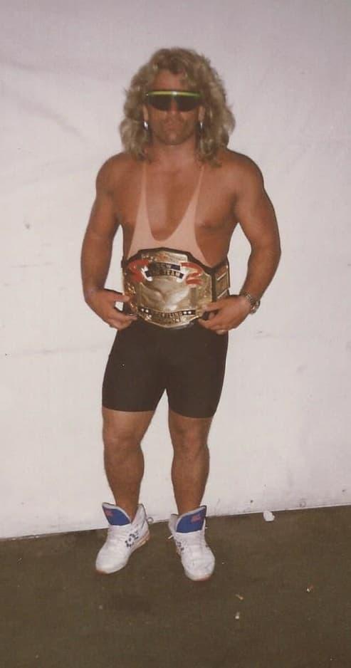 Chris Michaels as ECW Tag Team Champion with the Suicide Blondes, proving that former WWF enhancement talent could achieve championship gold in Paul Heyman’s revolutionary promotion. 