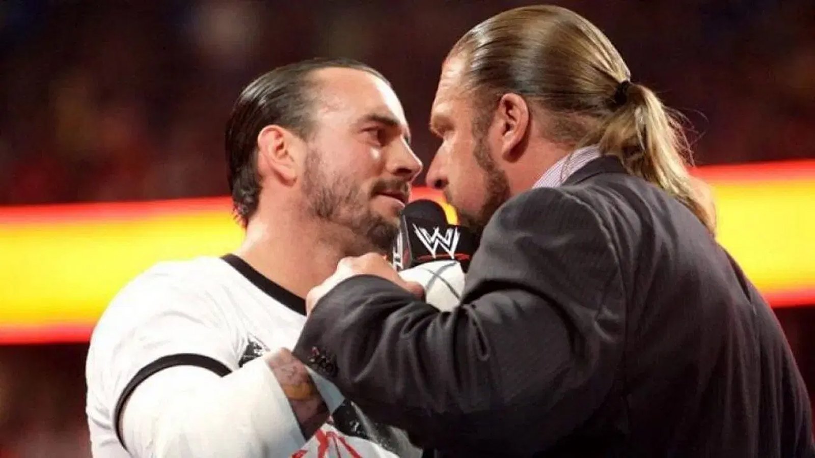 CM Punk and Triple get up and close in a WWE Raw face-to-face weeks before their eventual showdown at Night of Champions in 2011.