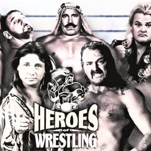 Behind Heroes of Wrestling: The late ’90s pay-per-view disaster that brought together wrestling legends such as Jim “The Anvil” Neidhart, The Bushwackers (Luke Williams and Butch Miller), Marty Jannetty, the Iron Sheik, Jake “The Snake” Roberts, Greg “The Hammer” Valentine, and Yokozuna – only to spiral into a fiasco that humiliated legends and tarnished careers.