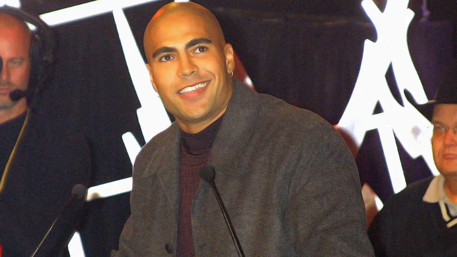 Maven Huffman celebrates winning WWE’s inaugural Tough Enough reality show on MTV alongside co-winner Nidia Guenard, earning a WWE contract and $1 million prize. 