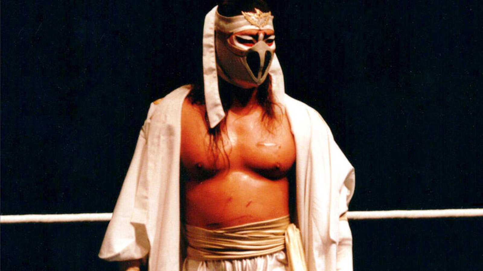 Eiji Ezaki in his prime as Hayabusa during the 1990s, before an FMW match. During this era, Hayabusa established himself as FMW's top draw through innovative high-flying techniques and emotional storytelling, becoming the promotion's most decorated main-event wrestler after founder Atsushi Onita.