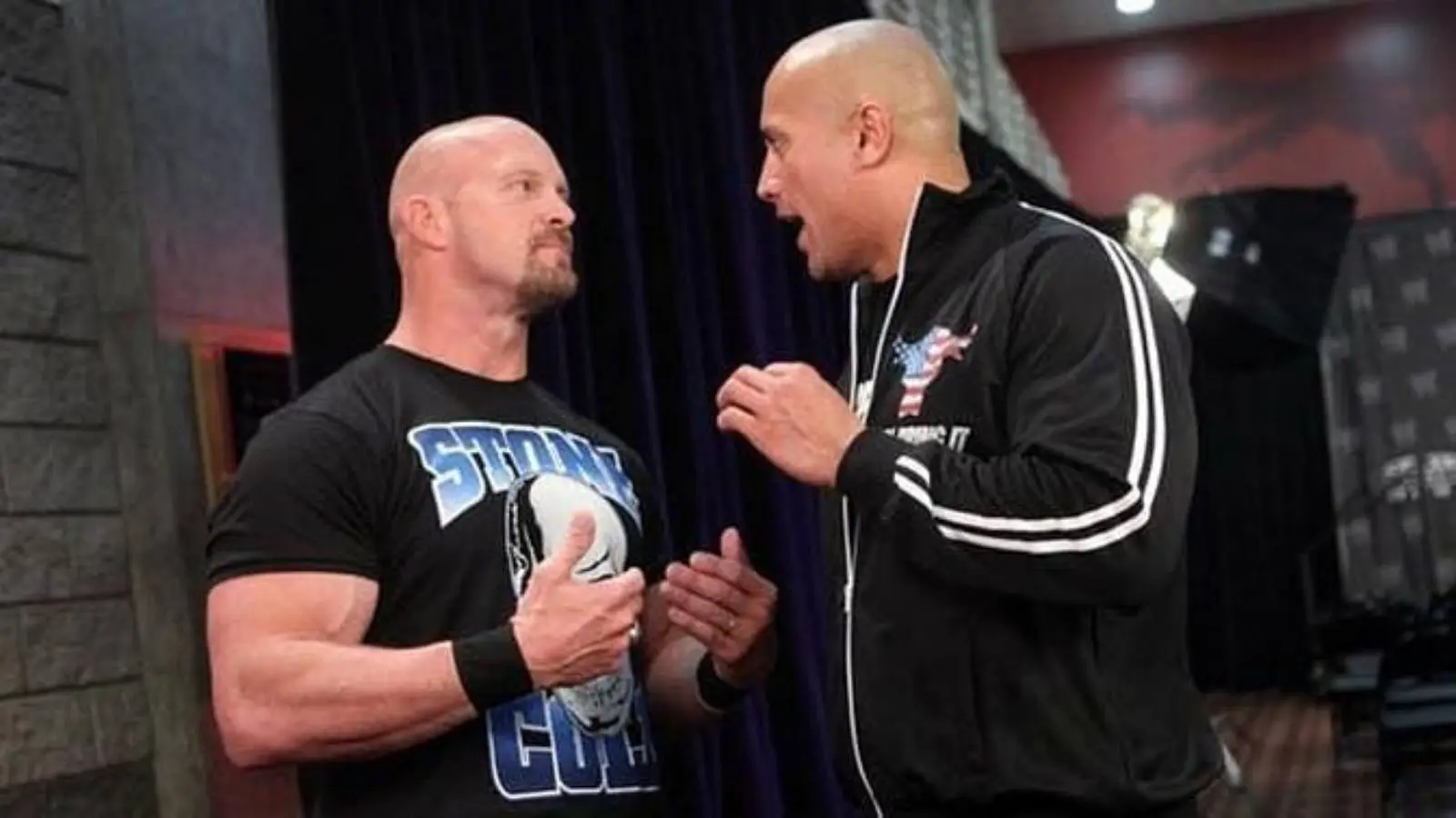 The Rock and Stone Cold Steve Austin share a rare backstage moment at WrestleMania 27 in 2011, reflecting on their iconic Attitude Era rivalry from years before. 