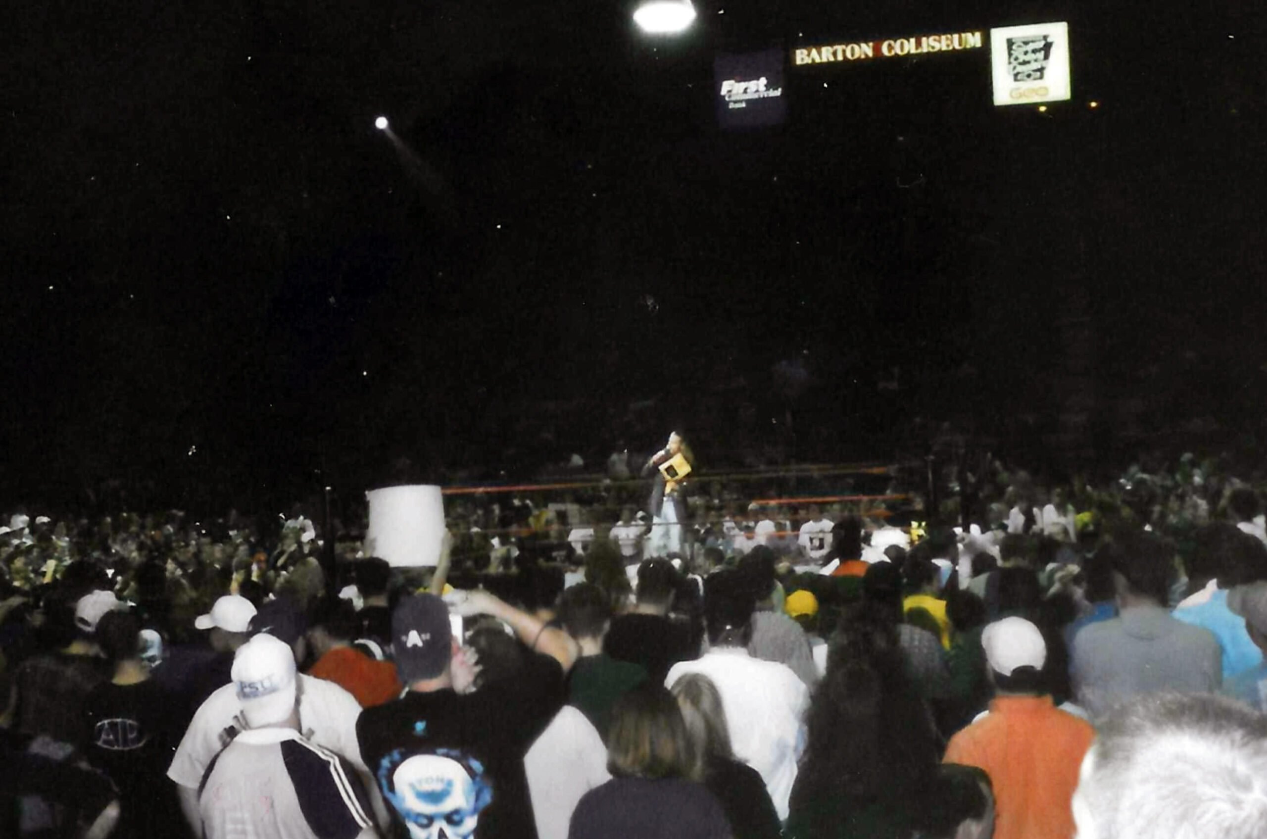 Shawn Michaels holds award before presenting to Danny Hodge at 1997 WWE Little Rock show that became historic riot