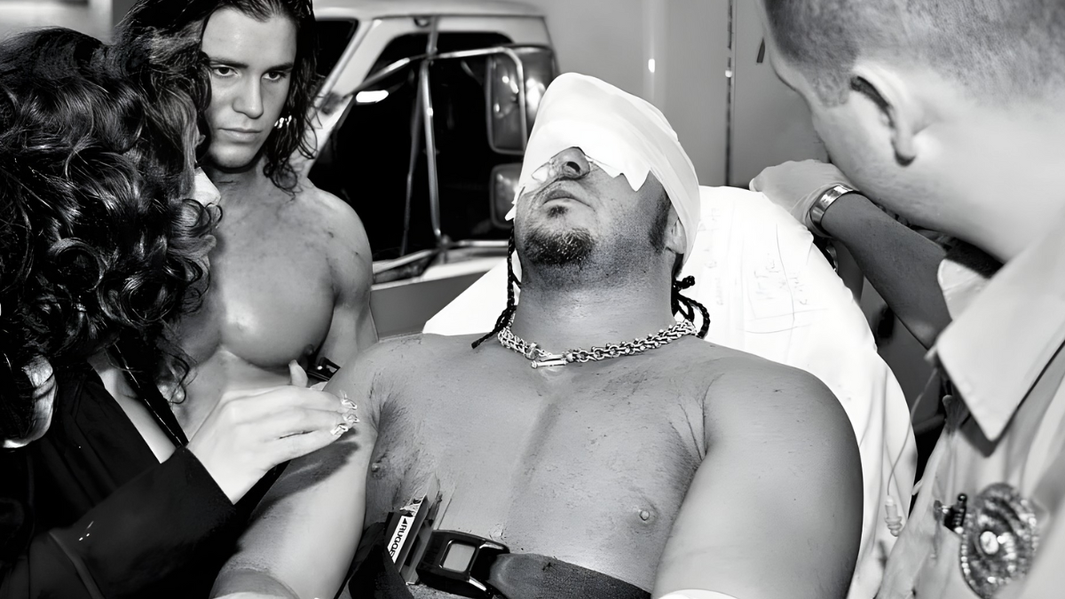 MNM members Melina and Johnny Nitro (John Morrison) attend to Joey Mercury during the Fatal 4-Way Ladder Match at WWE Armageddon December 17, 2006, after the ladder accident that resulted in Mercury's hospitalization and career-altering injury.