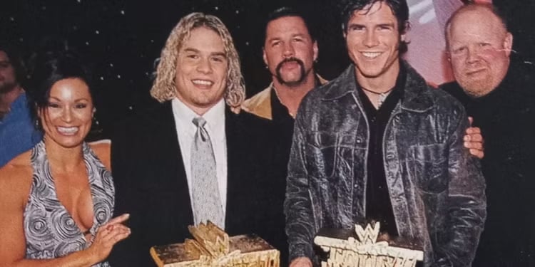 Matt Cappotelli and John Hennigan, later known as John Morrison, shown acceptin their Tough Enough Season 3 victory in 2002 as trainers Ivory (Lisa Moretti), Al Snow, and Bill DeMott presented their WWE contracts on the finale. 