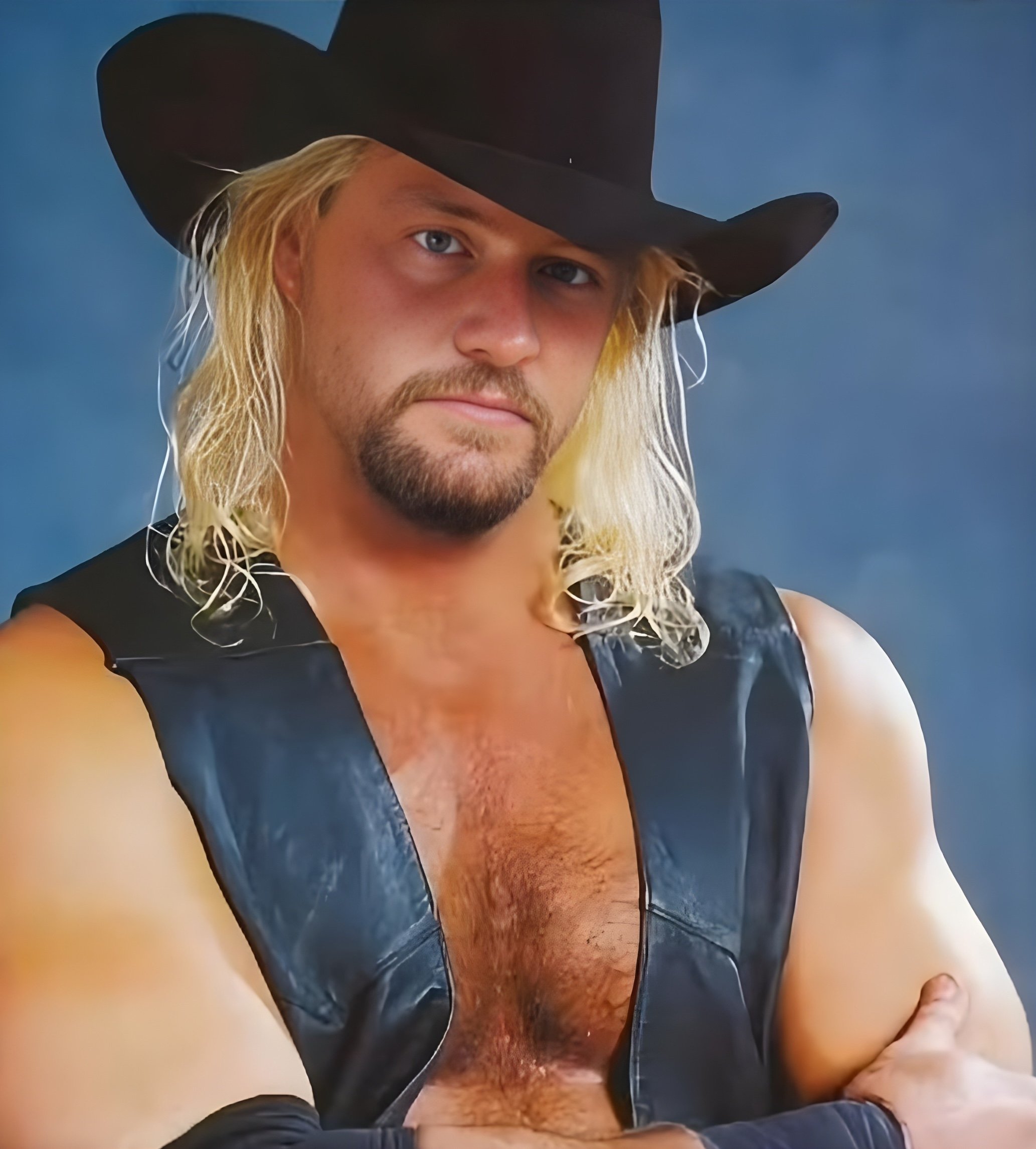 Bobby Duncum Jr., son of wrestling legend Bobby Duncum Sr., during his professional wrestling career, which included stints in Global Wrestling in Texas, All Japan Pro Wrestling, and WCW. Duncum Jr. gained his most notable recognition as part of the West Texas Rednecks faction in WCW alongside Curt Hennig and the Windham brothers before his untimely passing in January 2000 at age 34. 