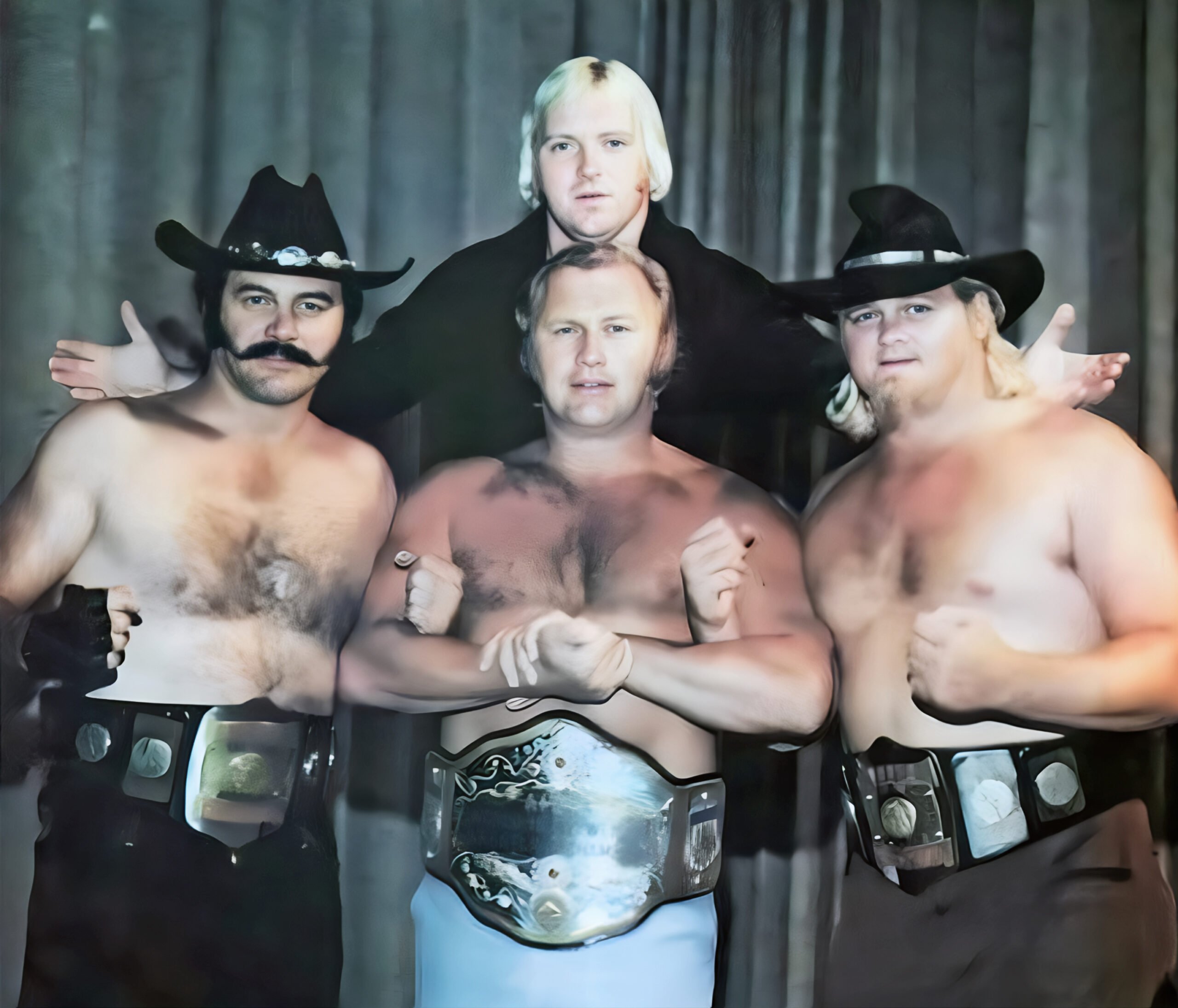 Bobby Duncum Sr. (far right) with The Bobby "The Brain" Heenan Family during their dominance of the AWA in the mid-1970s, alongside Bobby Heenan, Blackjack Lanza, and Nick Bockwinkel. Duncum and Lanza captured the AWA World Tag Team Championship in July 1976, holding the prestigious titles for nearly a year before their eventual loss to The High Flyers. 