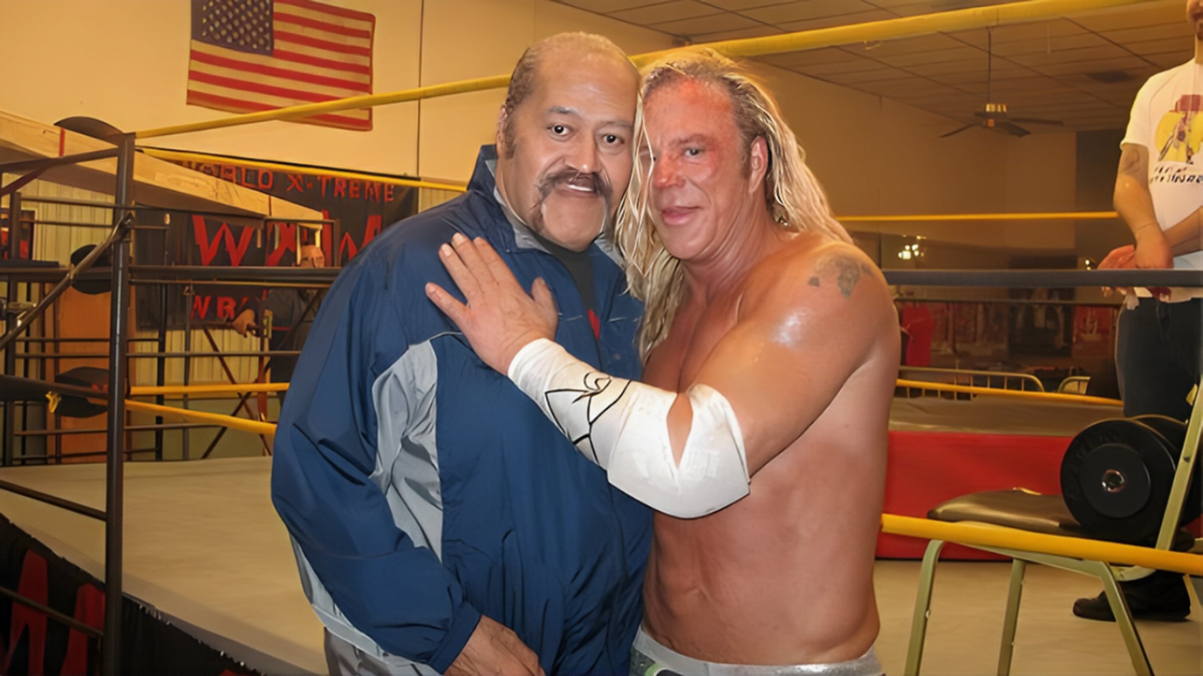 Mickey Rourke preparing for The Wrestler by training with WWE Hall of Famer Afa Anoa’i of the legendary tag team The Wild Samoans, and uncle and mentor to Roman Reigns. 