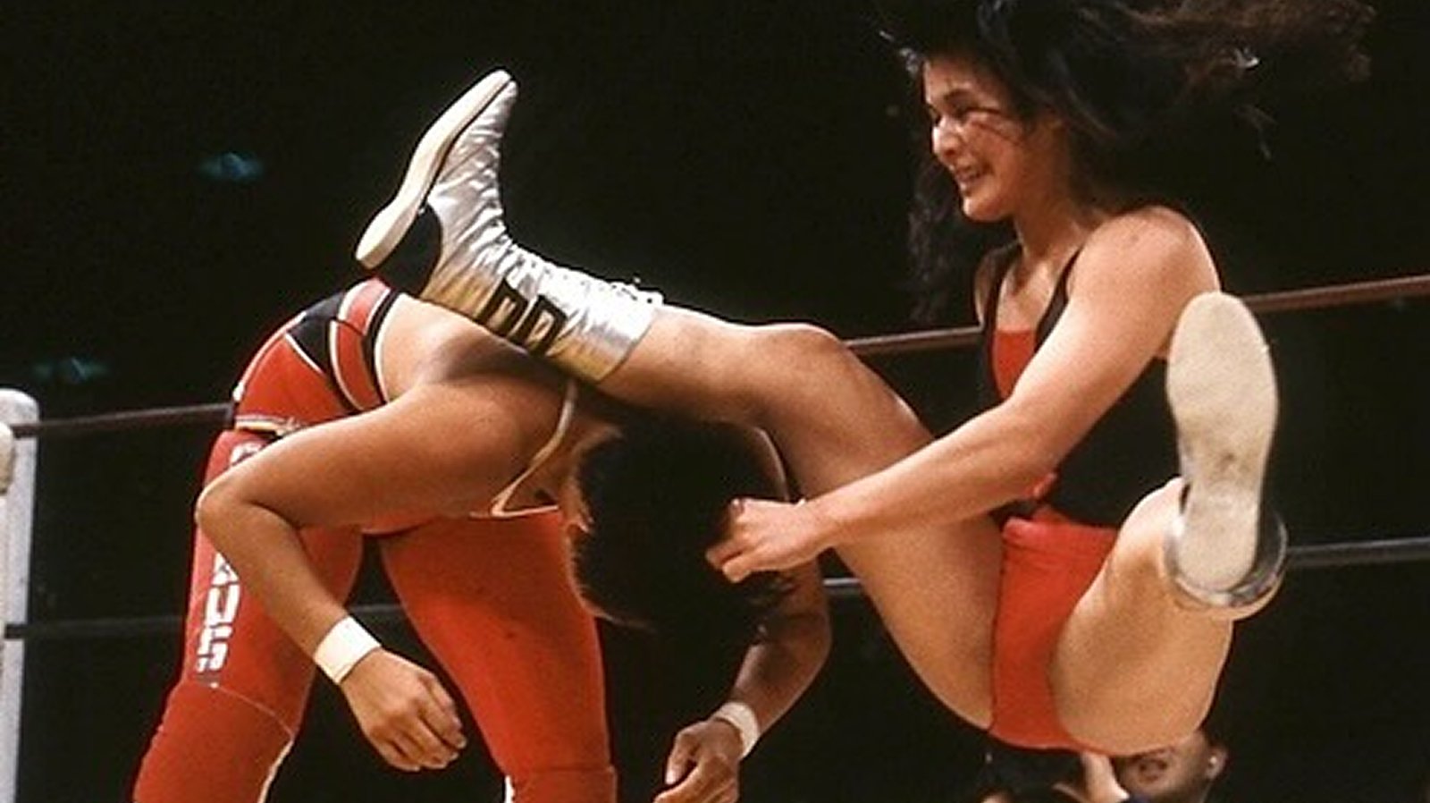 Itsuki Yamazaki of the Jumping Bomb Angels attacks Chigusa Nagayo of the Crush Gals during a classic All Japan Women’s Pro Wrestling tag team rivalry. 