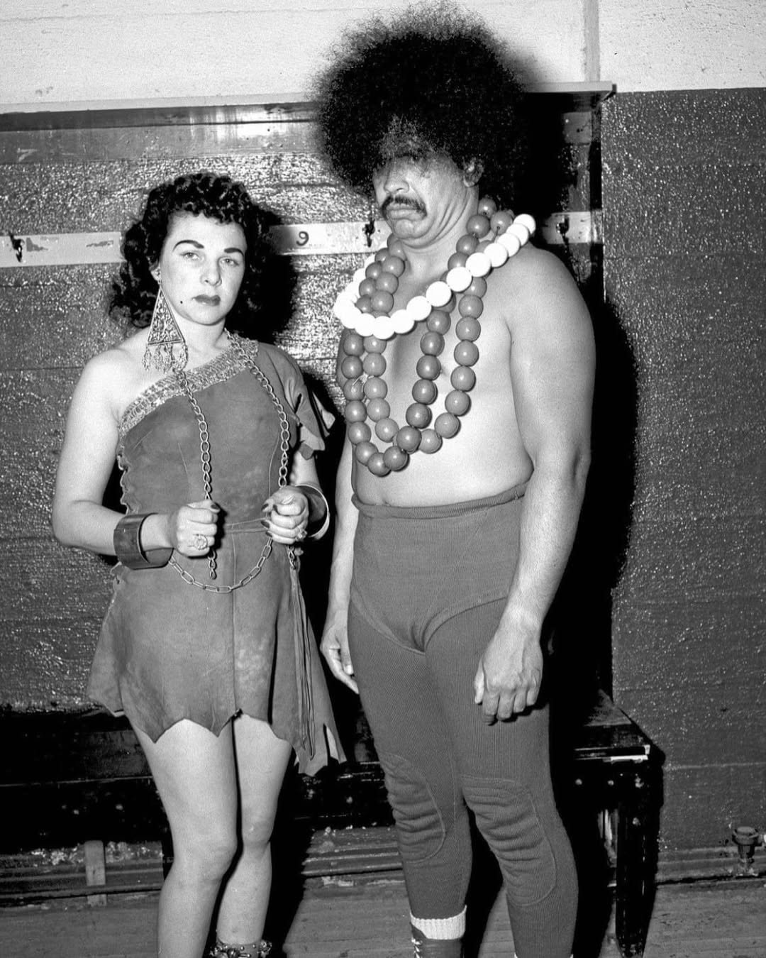 Elephant Boy (Tony Olivas) posing with Slave Girl Moolah circa 1952, a pairing that drew real heat in the segregation-era South. 