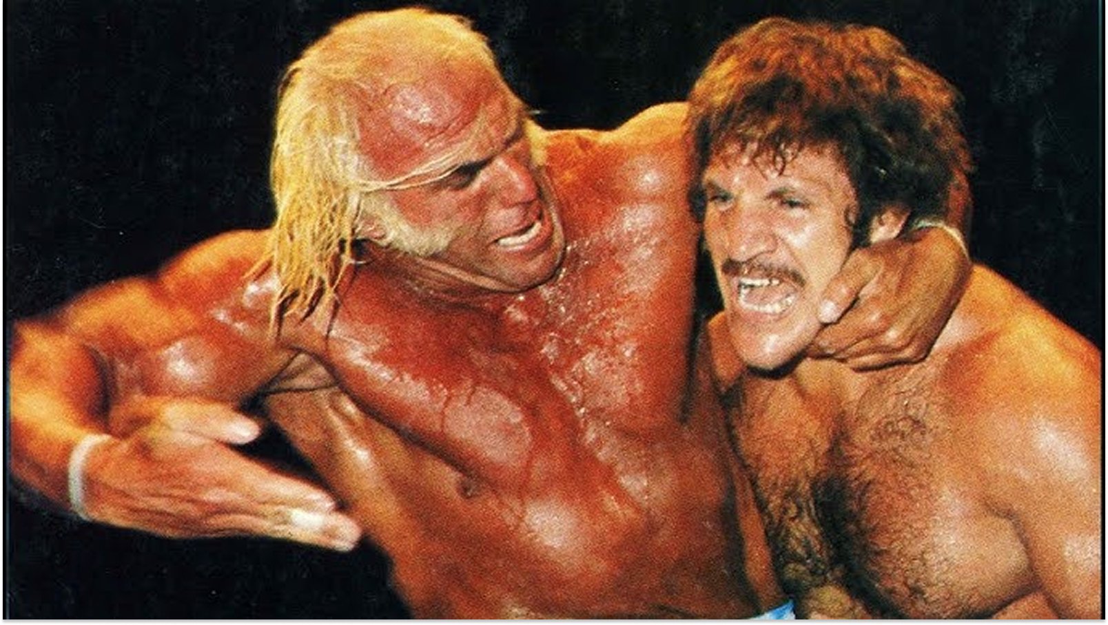 "Superstar" Billy Graham overpowers Bruno Sammartino during their legendary 1977 WWWF World Heavyweight Championship feud. Graham's flamboyant tie-dye gear and Muhammad Ali-inspired promos made him the perfect foil to Sammartino's blue-collar hero persona, producing one of the most memorable rivalries of the 1970s WWWF era. 