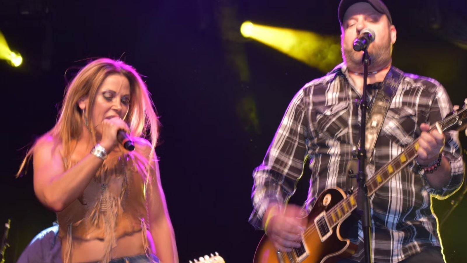 Mickie James performing country music a passion she developed while driving alone between wrestling shows