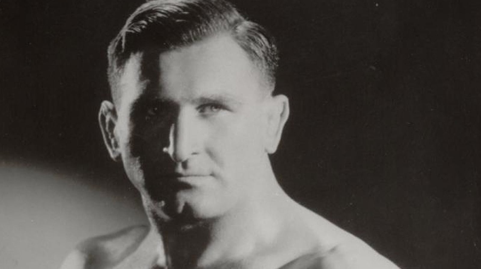 Earl McCready, the Oklahoma A&M–trained three-time NCAA heavyweight champion and 1928 Canadian Olympian, became a foundational scientific wrestler in Western Canada and the British Empire scene, winning the British Empire Heavyweight title.