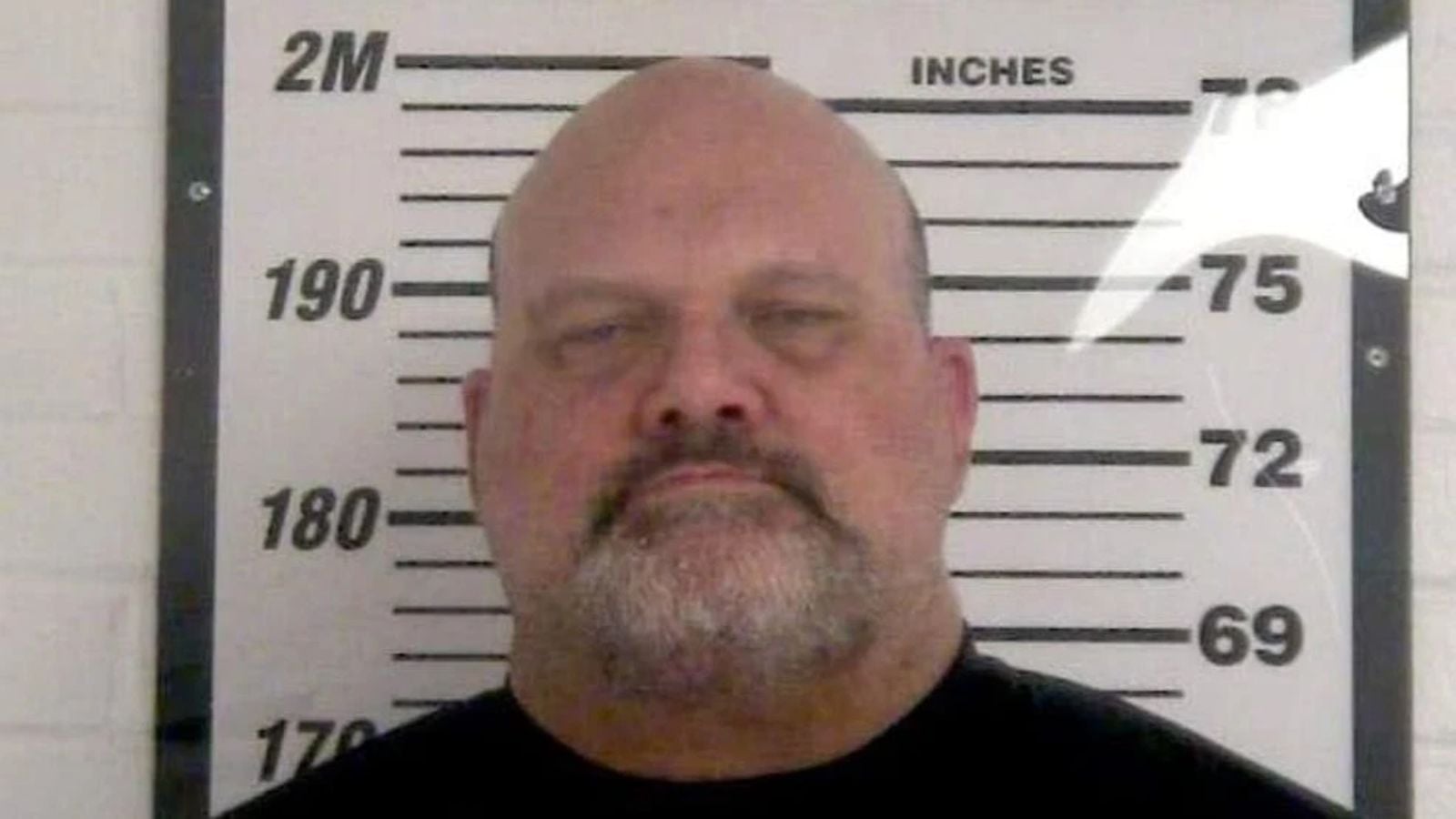 Mike "Duke The Dumpster" Droese, pictured in a booking photo following his 2025 indictment in Warren County, Tennessee, on a charge related to alleged illegal online activity involving a minor.